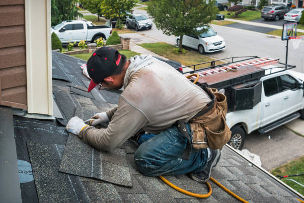 Professional Roofing technician working in Auburndale, MA